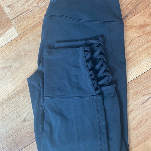 Athleta XS black capri with fun elastic side details! Excellent condition. - Picture 4 of 4